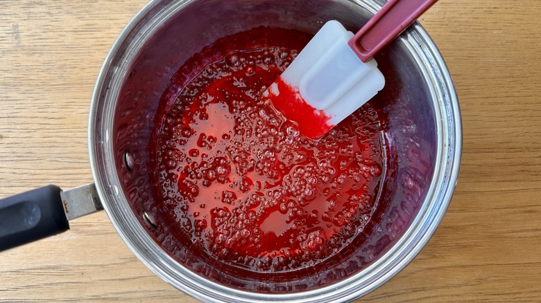 Red candy coating in pot