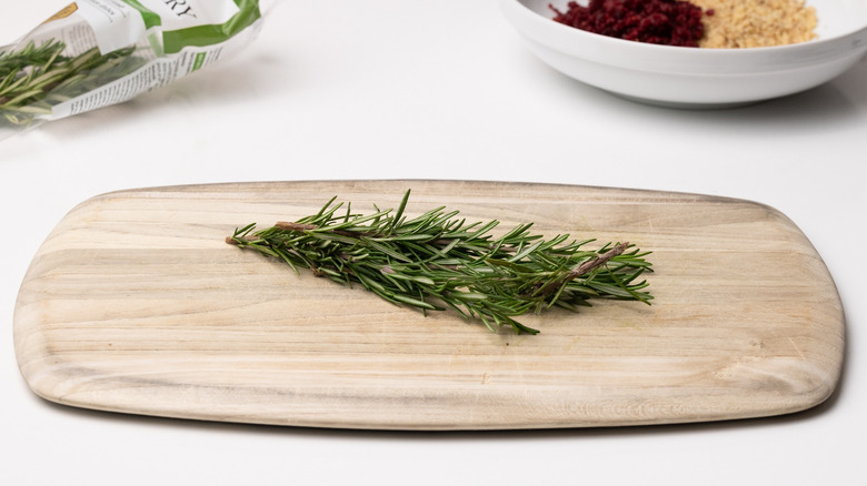 rosemary on a chopping board