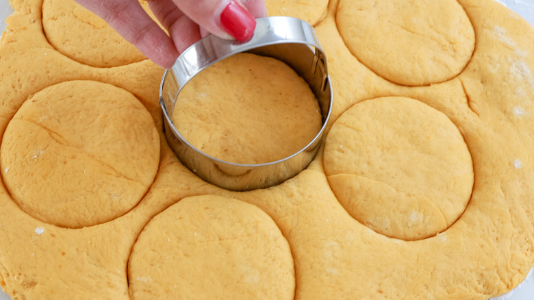 cutting rounds in pumpkin dough