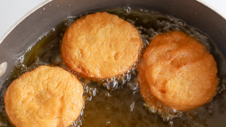 donuts frying in oil