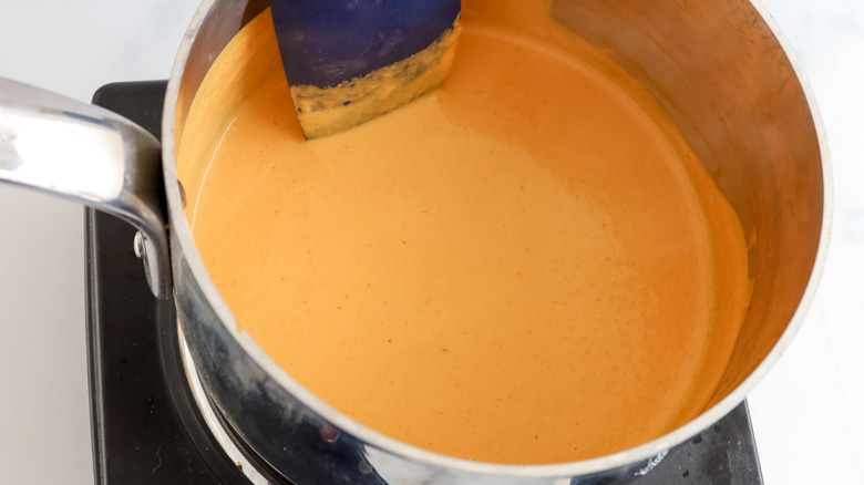 pumpkin filling heating in saucepan