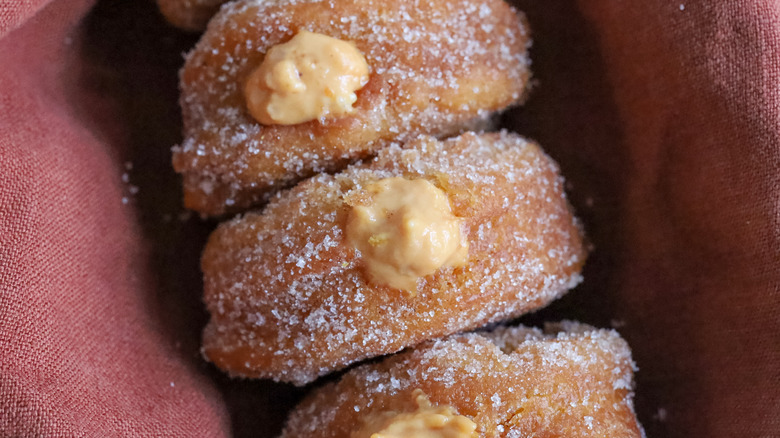 closeup pumpkin filled donuts