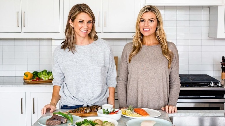 Emily Castro and Melissa Harrington in kitchen