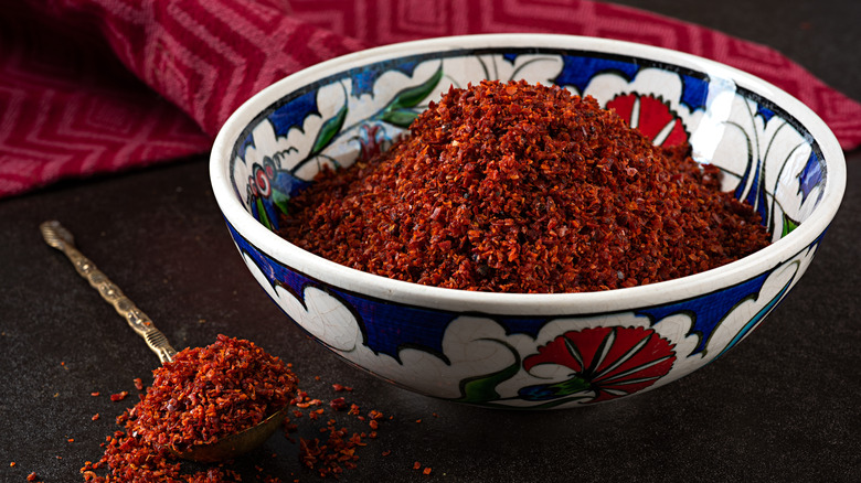 Bowl of cayenne powder and spoon