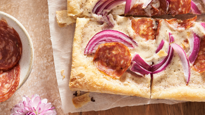 slice of pizza on table