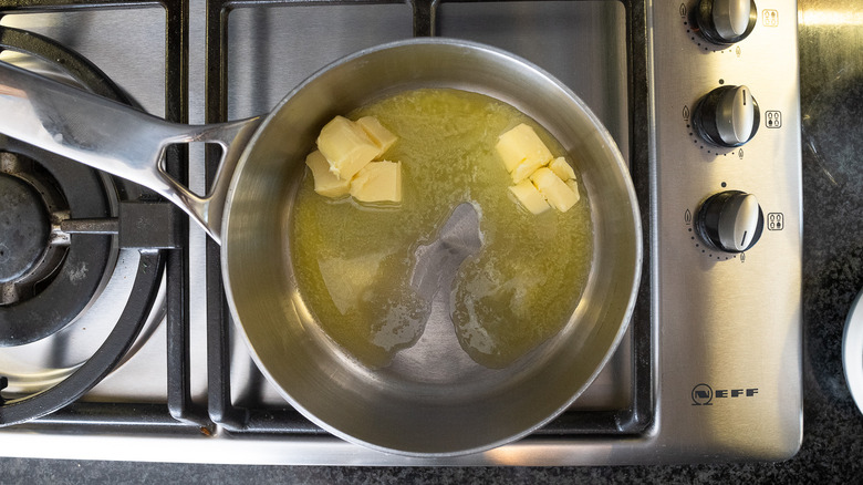 butter melting in saucepan 