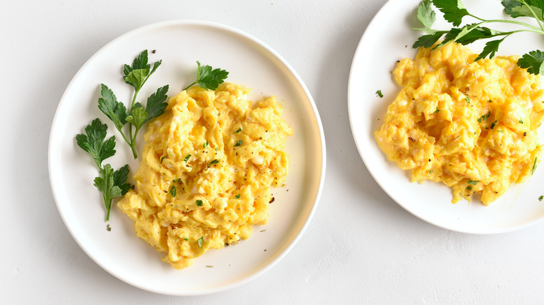 plates of fluffy scrambled eggs