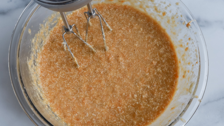 whisking sweet potato puree mixture