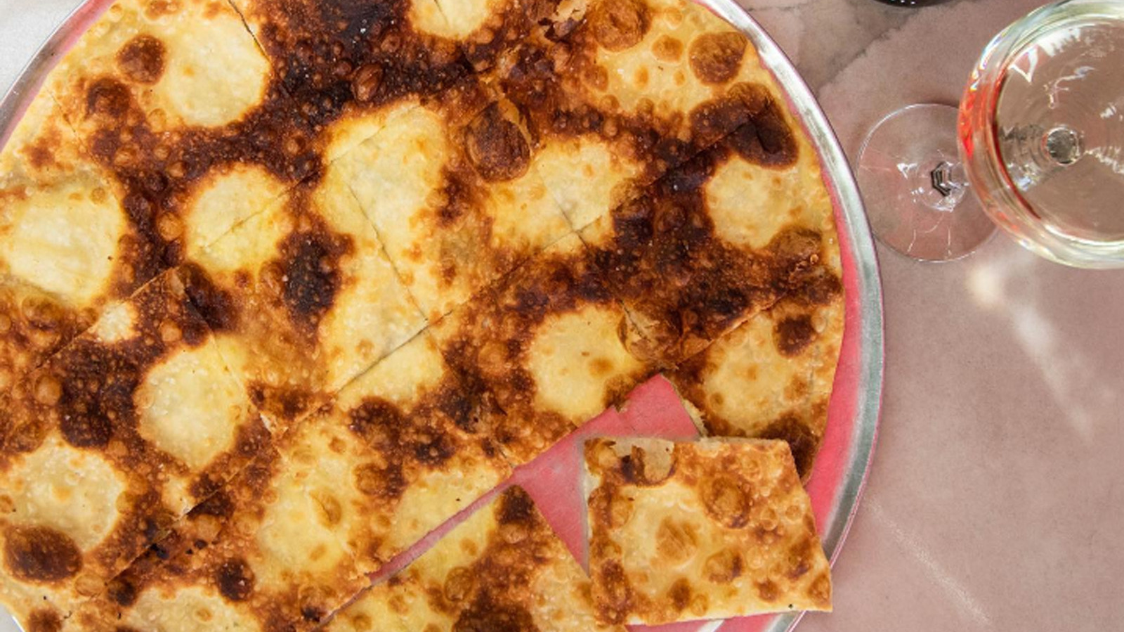 Focaccia Di Recco Is The Crispy, Cheesy Relative Of Italy's Famed Bread