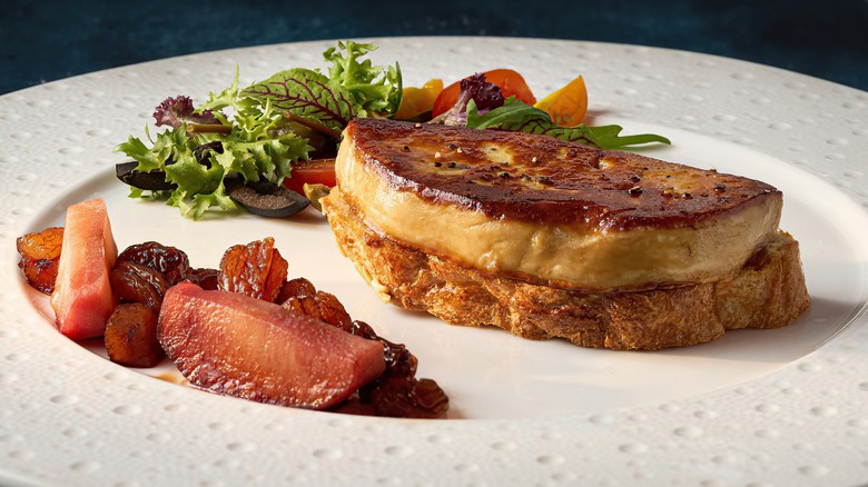 Foie gras with poached fruit and salad