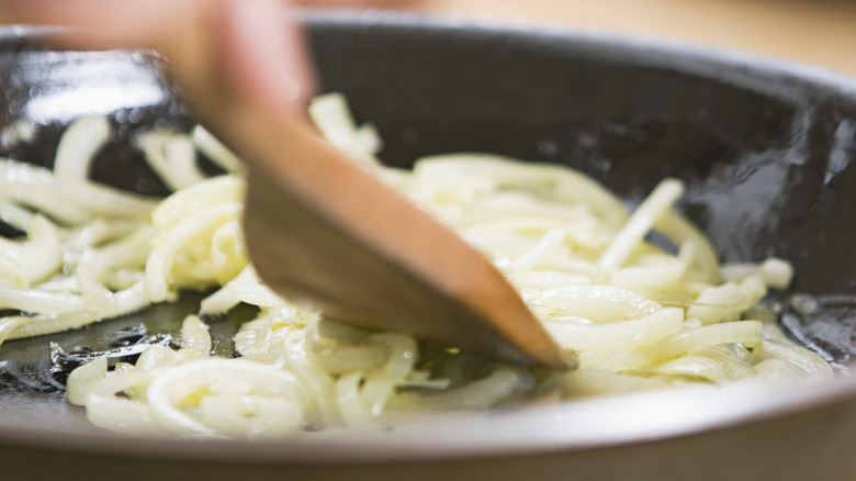 Frying onions in a pan