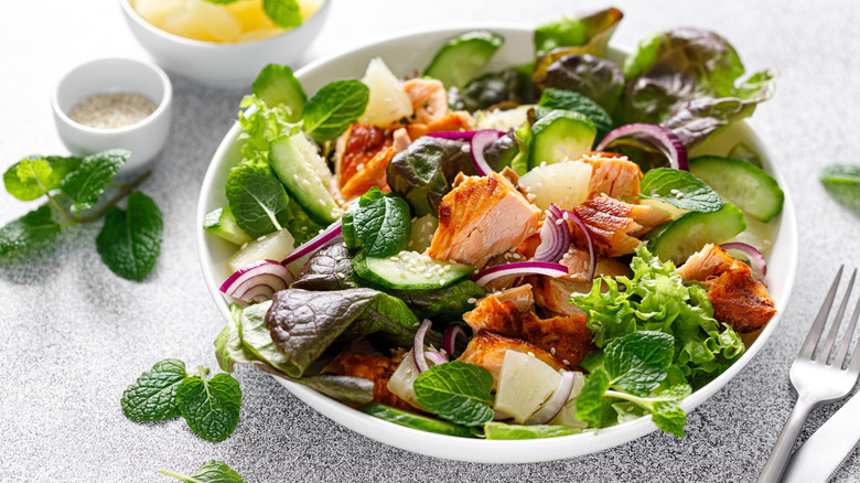 grilled salmon salad in a bowl