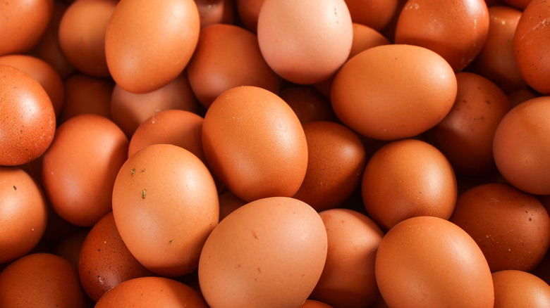 Lots of brown chicken eggs