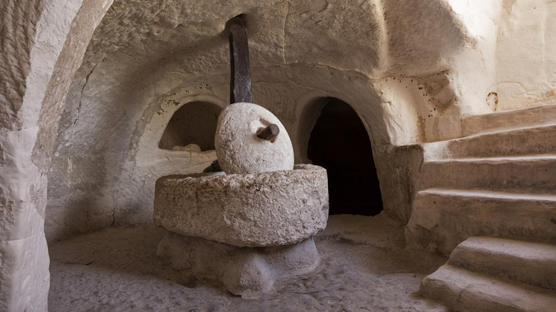 Ancient olive press in an underground cave at Bet Guvrin-Maresha National Park