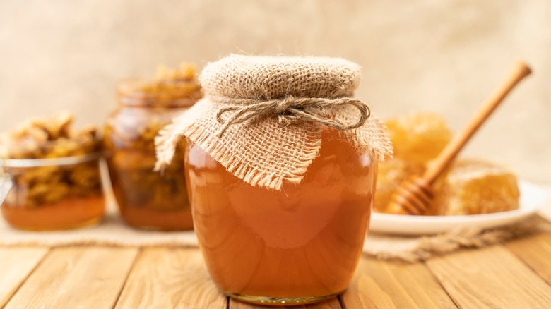 Jar of honey with comb 