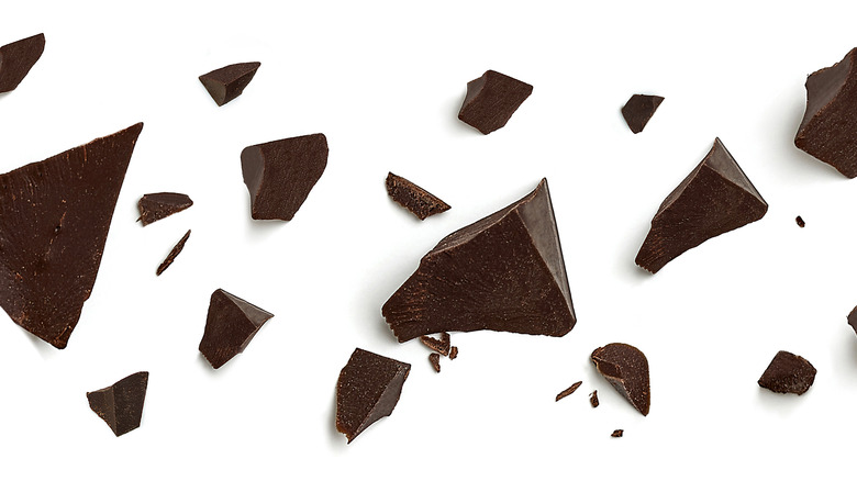 Chocolate shards on white background