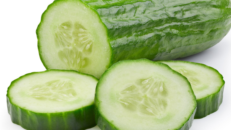 Sliced cucumber on white background