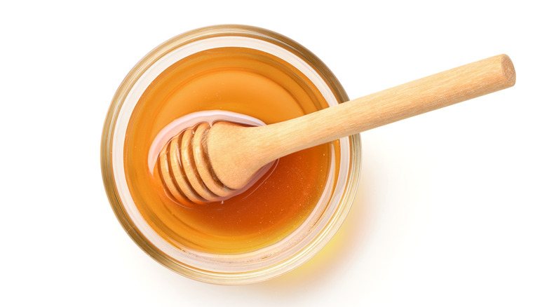 Honey in dish with spoon