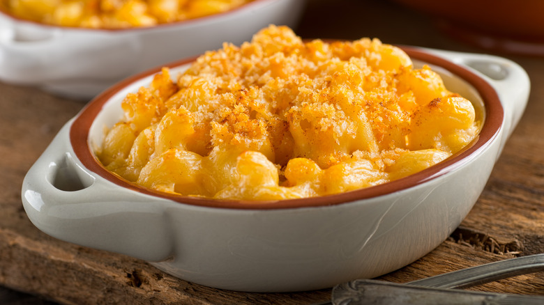 Dish of mac and cheese with crispy topping