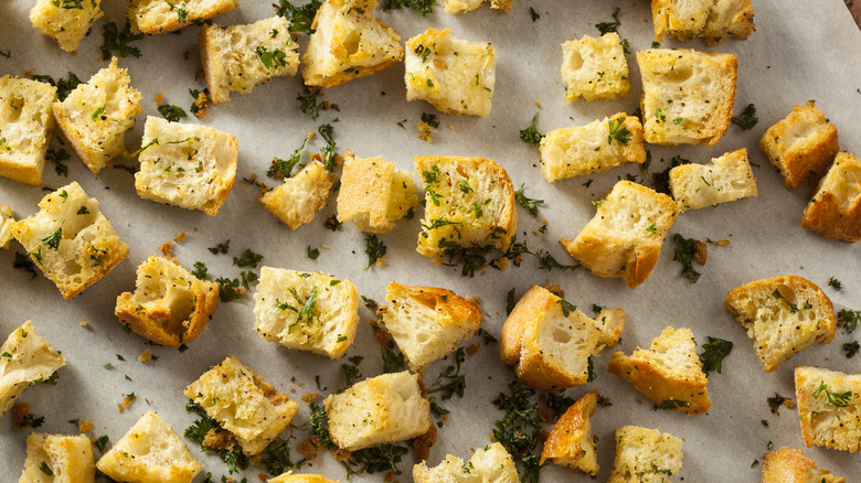 tray of seasoned homemade croutons