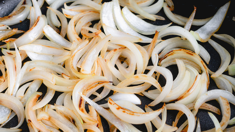 Sautéing onions in a pan