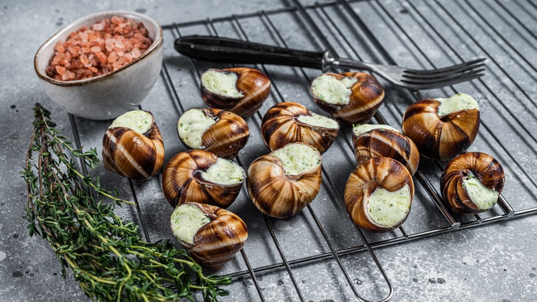 escargot on a grill grate