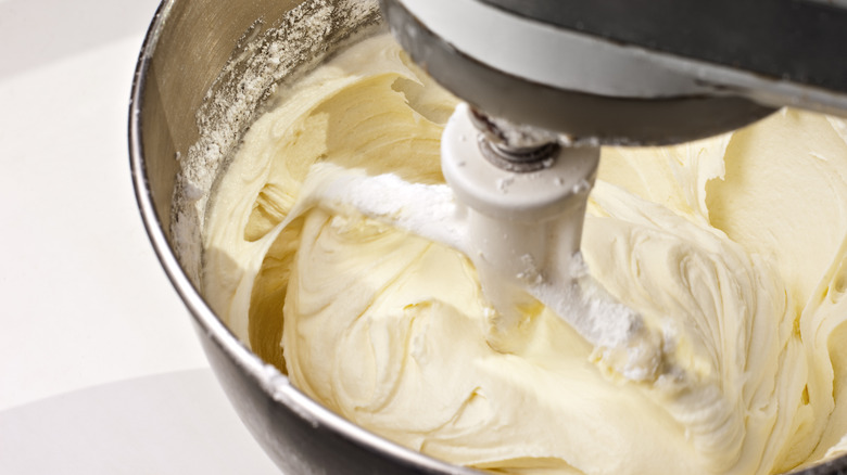 buttercream frosting in mixer with paddle