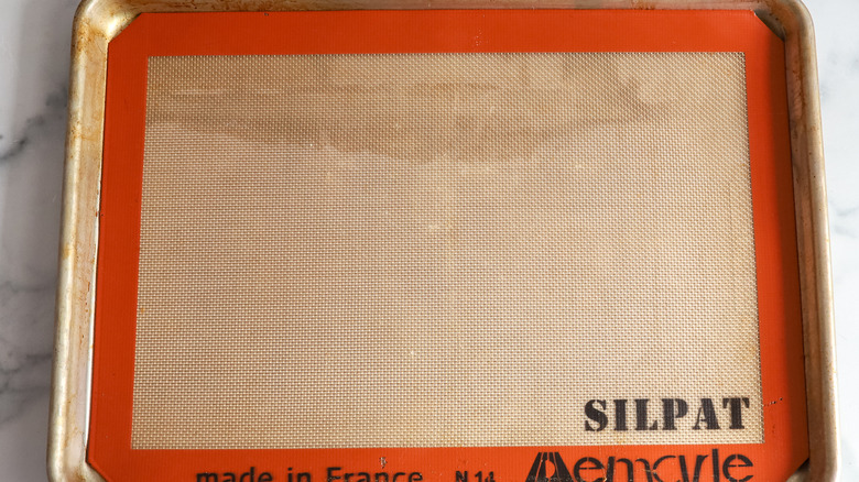 baking sheet lined with a silicone mat