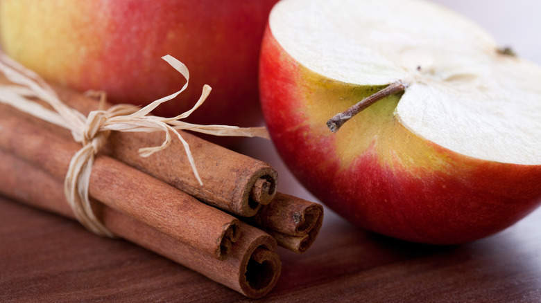 Apples and cinnamon sticks