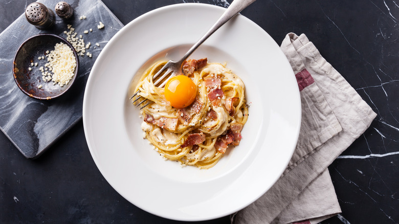 Spaghetti carbonara with egg and bacon