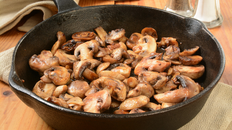 sauteed mushrooms in cast iron skillet