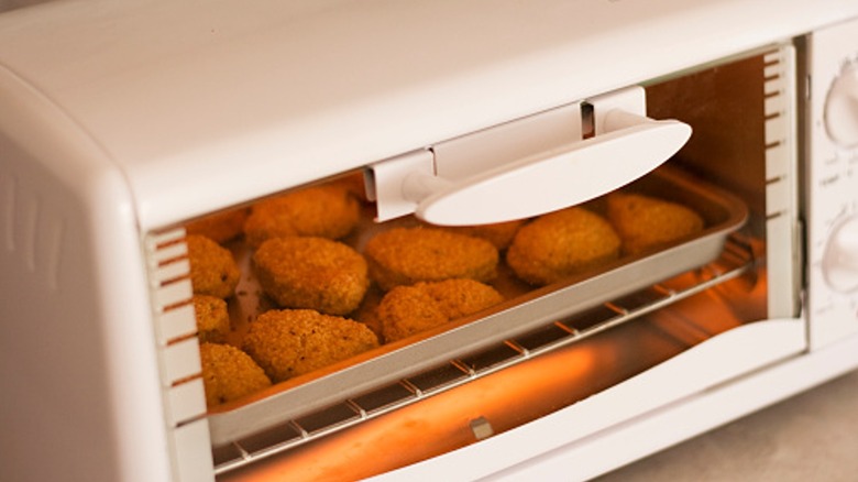 Chicken nuggets cooking in toaster oven 