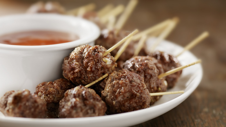 Meatballs on a platter with toothpicks
