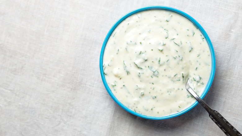 Homemade ranch dressing in a blue dish