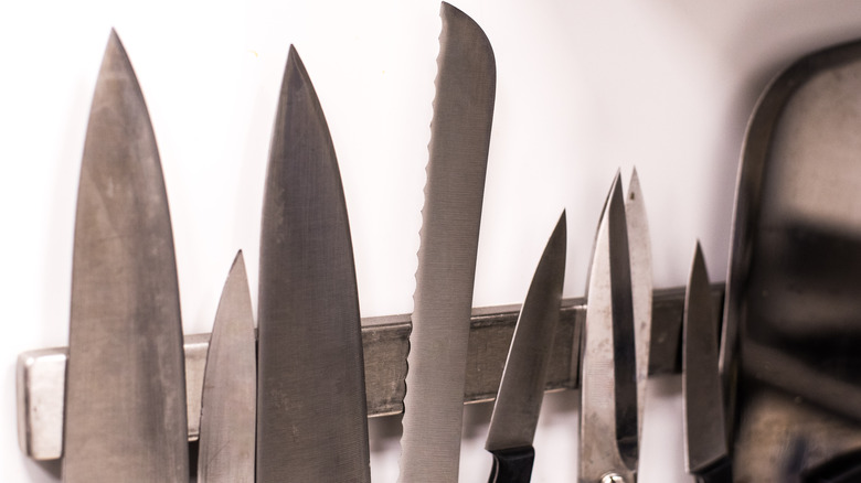 knives hanging on a rack