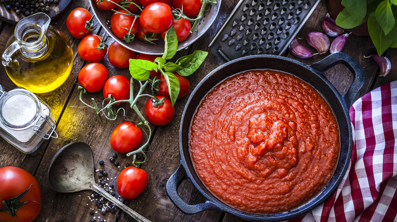 tomato sauce with olive oil and ingredients