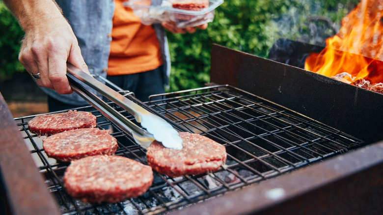 Burgers cooking on grill