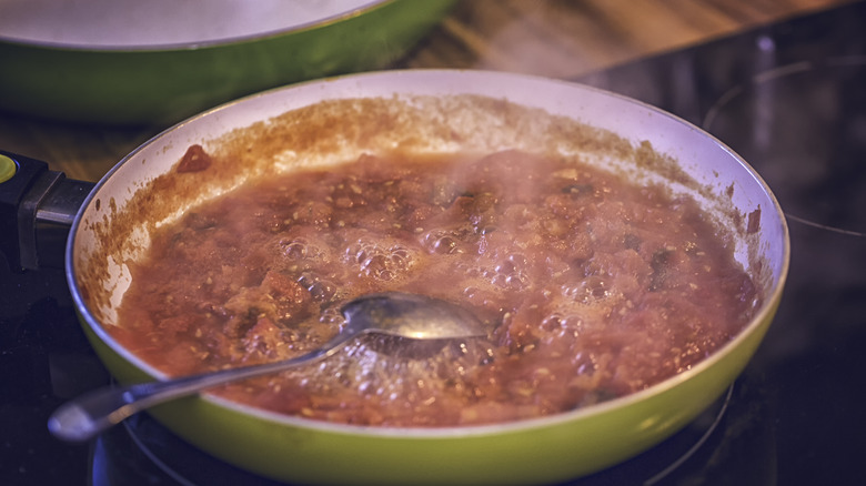 Tomato sauce cooking in pan