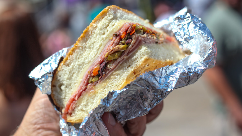 wedge of muffuletta sandwich