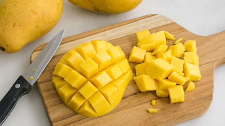 diced mango on cutting board