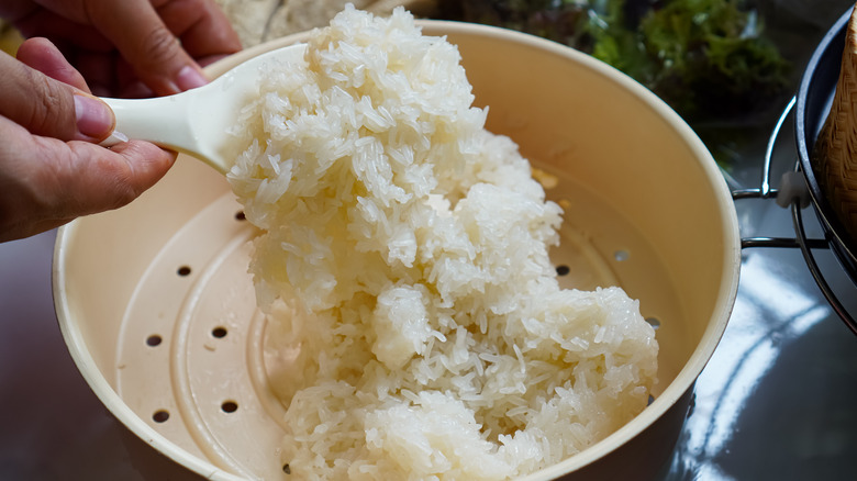 steamed glutinous rice in a steamer basket