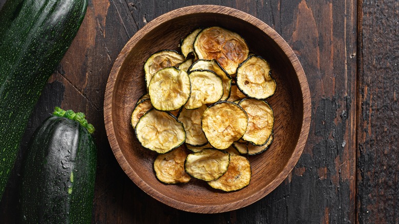 zucchini chips in wooden bowl