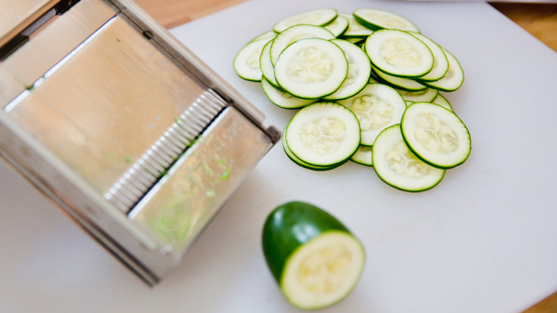 sliced zucchini and mandoline slicer