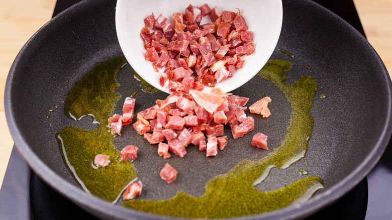 adding bacon bits to skillet