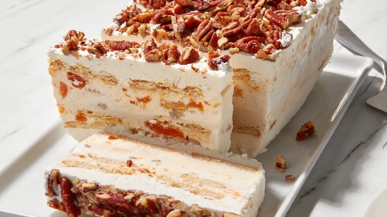 peach and butter pecan icebox cake with slices cut