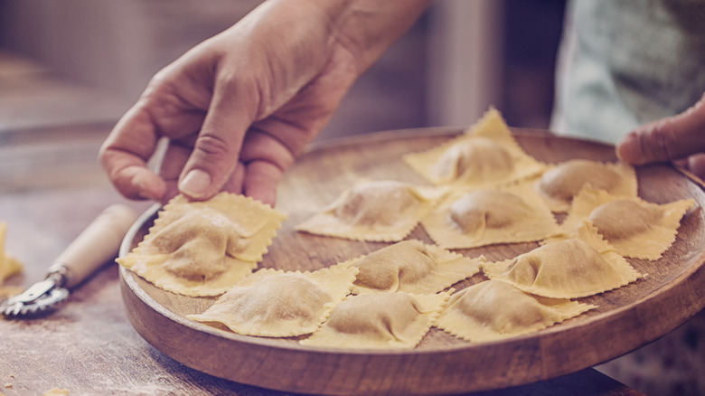 uncooked ravioli on board