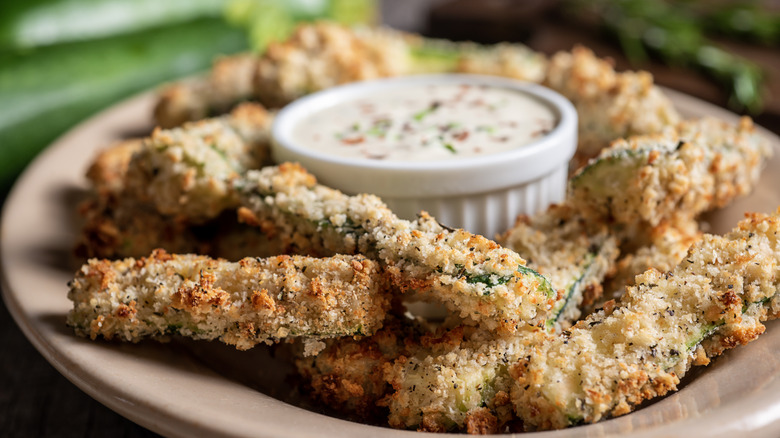 plate of zucchini fries with dipping sauce