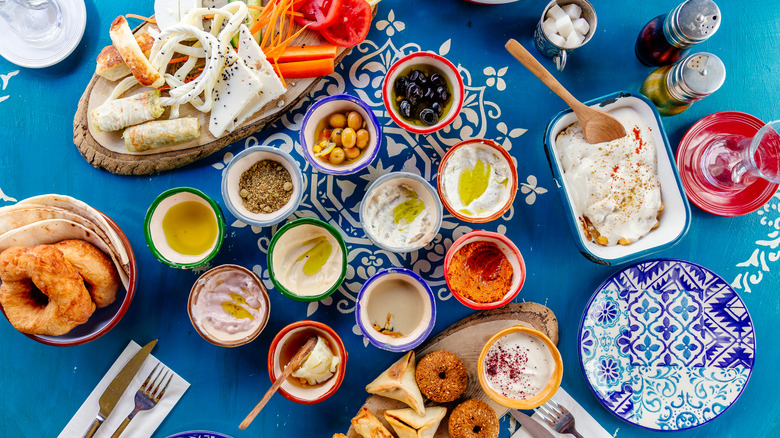 middle eastern mezze on blue table