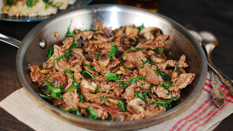 shaved steak in a skillet