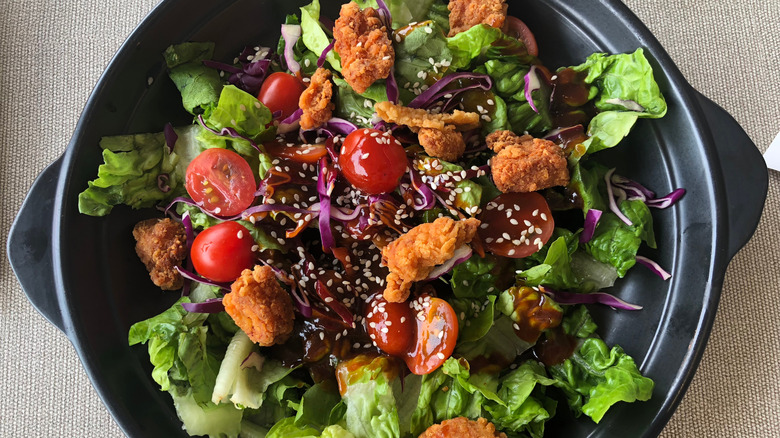 popcorn chicken on salad